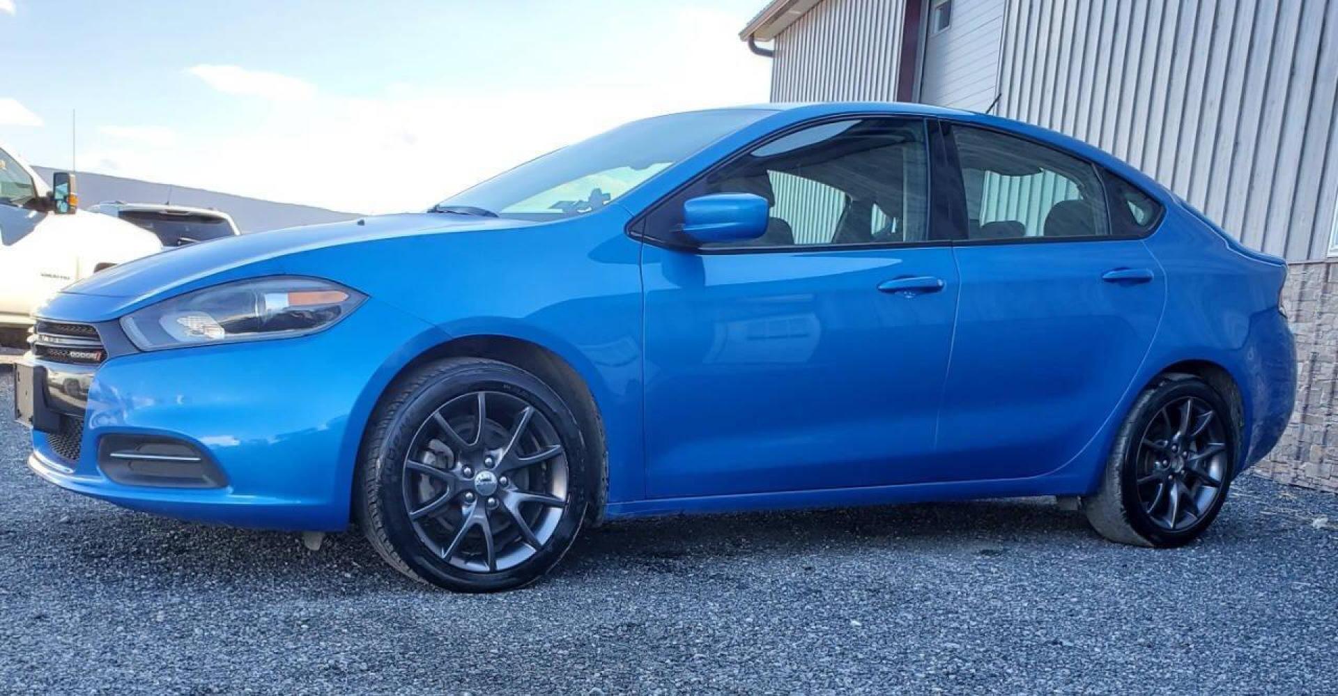 2015 Blue Dodge Dart (1C3CDFAA1FD) with an 2.0L I4 2.0L I4 engine, located at 4845 Woodbury Pike, Roaring Springs, PA, (814) 317-5008, (814) 317-5008, 40.250935, -78.366959 - 2015 Dodge Dart SE 2.0L I4 FWD 6-speed Automatic Flex Fuel Newly drilled/slotted brakes and rotors, A/c, Power Windows and Locks, Cruise Control, Single CD Player. Clean, sharp looking car! It will come with a new inspection and a 3-month/3,000-mile warranty (with the option to upgrade). If you have - Photo#3