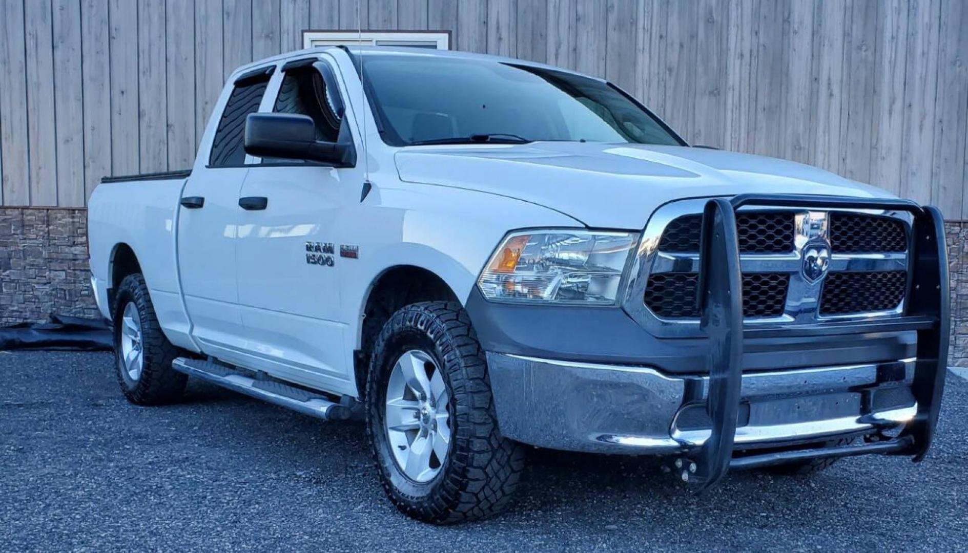 2015 White RAM 1500 (1C6RR7FTXFS) with an 5.7L V8 5.7L V8 engine, located at 4845 Woodbury Pike, Roaring Springs, PA, (814) 317-5008, (814) 317-5008, 40.250935, -78.366959 - 2015 RAM 1500 Tradesman Hemi Quad Cab 4x4 5.7L V8 Automatic 262k Miles This truck has a brand-new crate engine motor that comes with a 2 yr/100,000-mile warranty. A/c, Power Windows and Locks, Cruise Control, Bed Cover. Very clean Southern truck! New Inspection. Truck itself will come with a 3-month - Photo#0