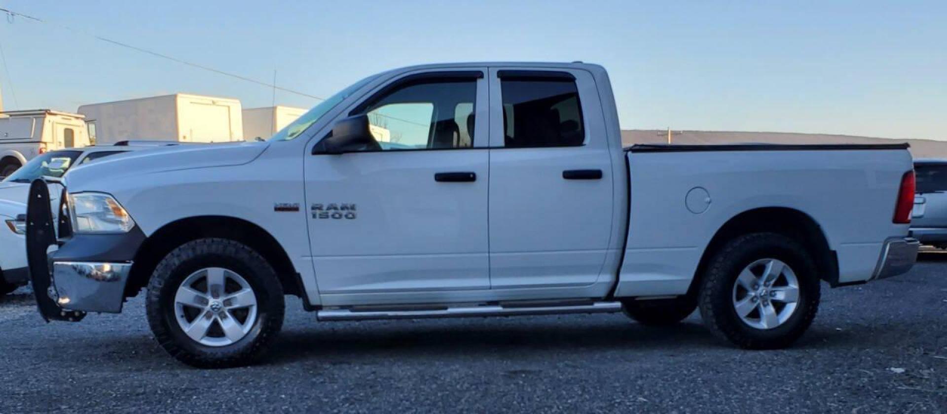 2015 White RAM 1500 (1C6RR7FTXFS) with an 5.7L V8 5.7L V8 engine, located at 4845 Woodbury Pike, Roaring Springs, PA, (814) 317-5008, (814) 317-5008, 40.250935, -78.366959 - 2015 RAM 1500 Tradesman Hemi Quad Cab 4x4 5.7L V8 Automatic 262k Miles This truck has a brand-new crate engine motor that comes with a 2 yr/100,000-mile warranty. A/c, Power Windows and Locks, Cruise Control, Bed Cover. Very clean Southern truck! New Inspection. Truck itself will come with a 3-month - Photo#3