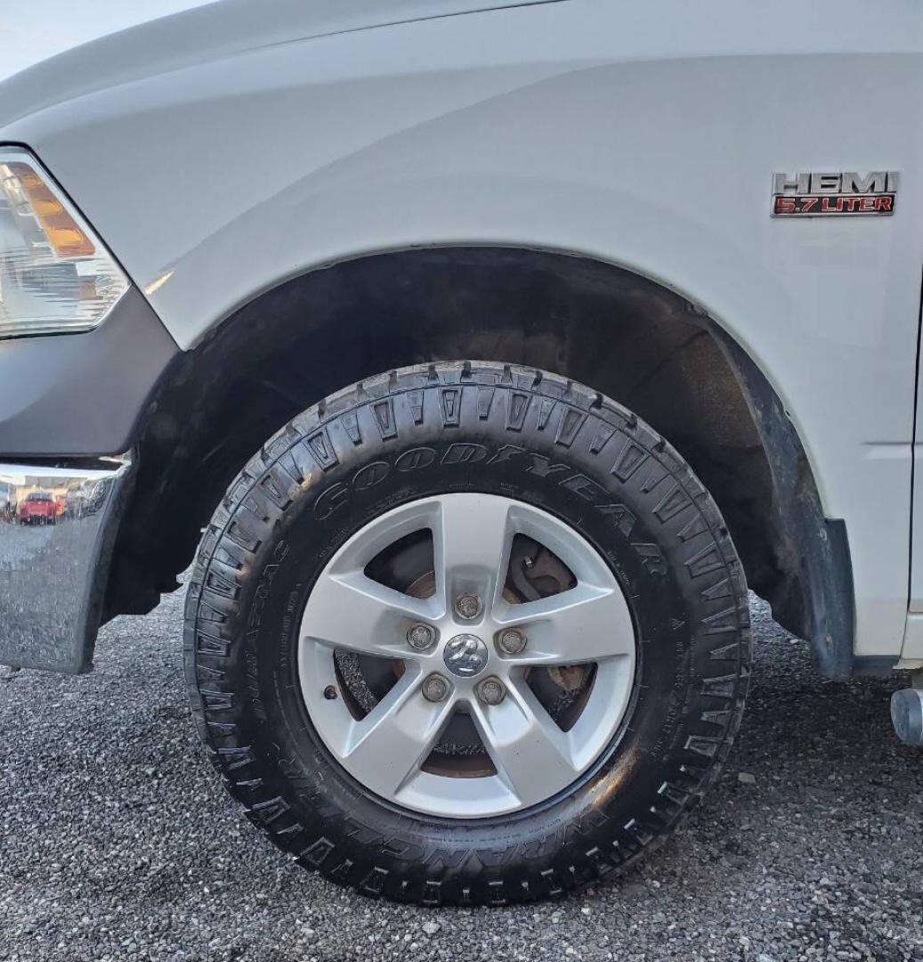 2015 White RAM 1500 (1C6RR7FTXFS) with an 5.7L V8 5.7L V8 engine, located at 4845 Woodbury Pike, Roaring Springs, PA, (814) 317-5008, (814) 317-5008, 40.250935, -78.366959 - 2015 RAM 1500 Tradesman Hemi Quad Cab 4x4 5.7L V8 Automatic 262k Miles This truck has a brand-new crate engine motor that comes with a 2 yr/100,000-mile warranty. A/c, Power Windows and Locks, Cruise Control, Bed Cover. Very clean Southern truck! New Inspection. Truck itself will come with a 3-month - Photo#6