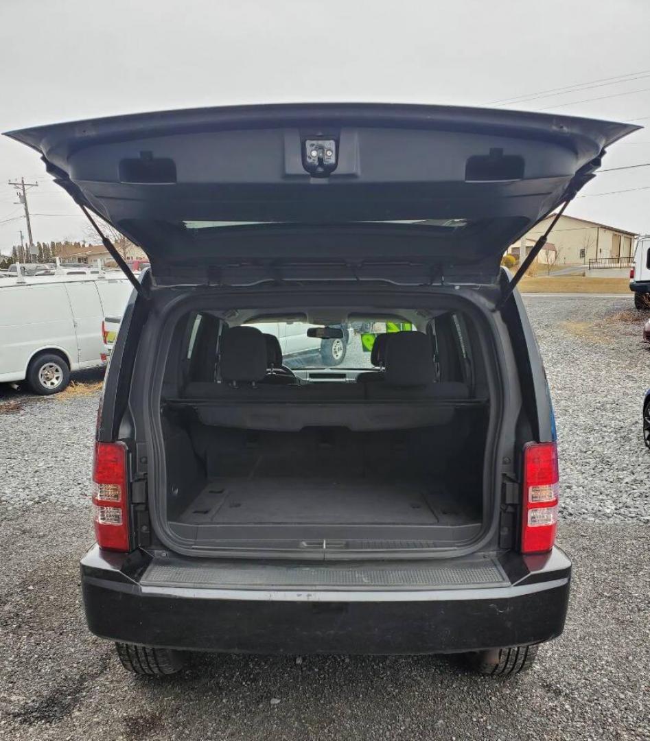 2012 Black Jeep Liberty (1C4PJMAK1CW) with an 3.7L V6 210hp 235ft. lbs. 3.7L V6 engine, located at 4845 Woodbury Pike, Roaring Springs, PA, (814) 317-5008, (814) 317-5008, 40.250935, -78.366959 - 2012 Jeep Liberty Sport 4x4 3.7L V6 4-speed Automatic 168k Miles A/c, Power Windows and Locks, Cruise Control, Sirius XM, CD Player, Keyless Entry. Nice Southern Vehicle! New Inspection. Will come with 3-month/3,000-mile warranty with the option to upgrade. If you have any questions or would like to - Photo#3