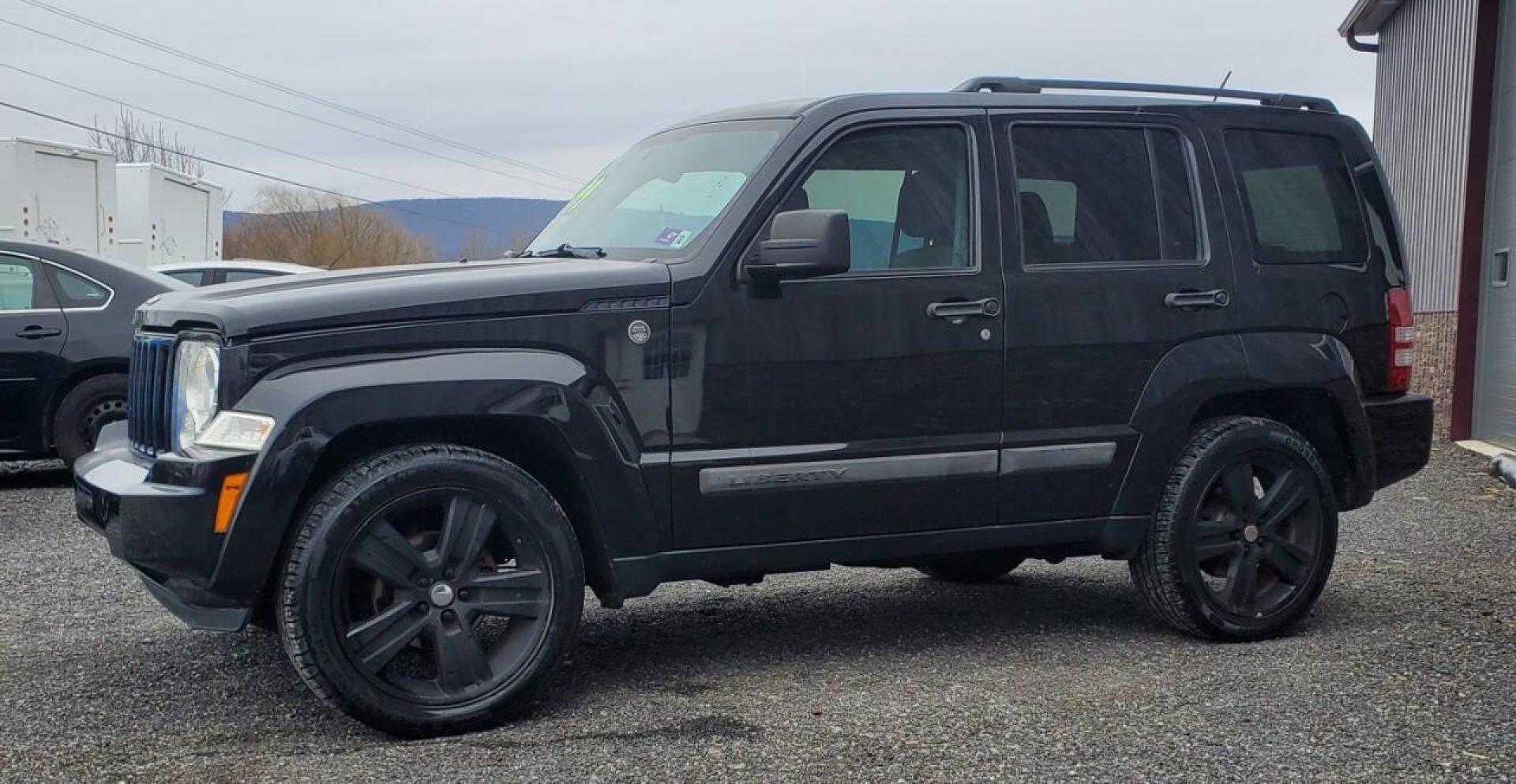 2012 Black Jeep Liberty (1C4PJMAK1CW) with an 3.7L V6 210hp 235ft. lbs. 3.7L V6 engine, located at 4845 Woodbury Pike, Roaring Springs, PA, (814) 317-5008, (814) 317-5008, 40.250935, -78.366959 - 2012 Jeep Liberty Sport 4x4 3.7L V6 4-speed Automatic 168k Miles A/c, Power Windows and Locks, Cruise Control, Sirius XM, CD Player, Keyless Entry. Nice Southern Vehicle! New Inspection. Will come with 3-month/3,000-mile warranty with the option to upgrade. If you have any questions or would like to - Photo#4
