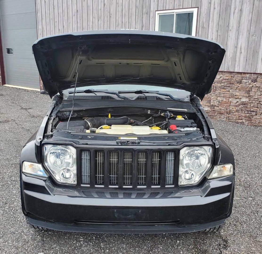2012 Black Jeep Liberty (1C4PJMAK1CW) with an 3.7L V6 210hp 235ft. lbs. 3.7L V6 engine, located at 4845 Woodbury Pike, Roaring Springs, PA, (814) 317-5008, (814) 317-5008, 40.250935, -78.366959 - 2012 Jeep Liberty Sport 4x4 3.7L V6 4-speed Automatic 168k Miles A/c, Power Windows and Locks, Cruise Control, Sirius XM, CD Player, Keyless Entry. Nice Southern Vehicle! New Inspection. Will come with 3-month/3,000-mile warranty with the option to upgrade. If you have any questions or would like to - Photo#5