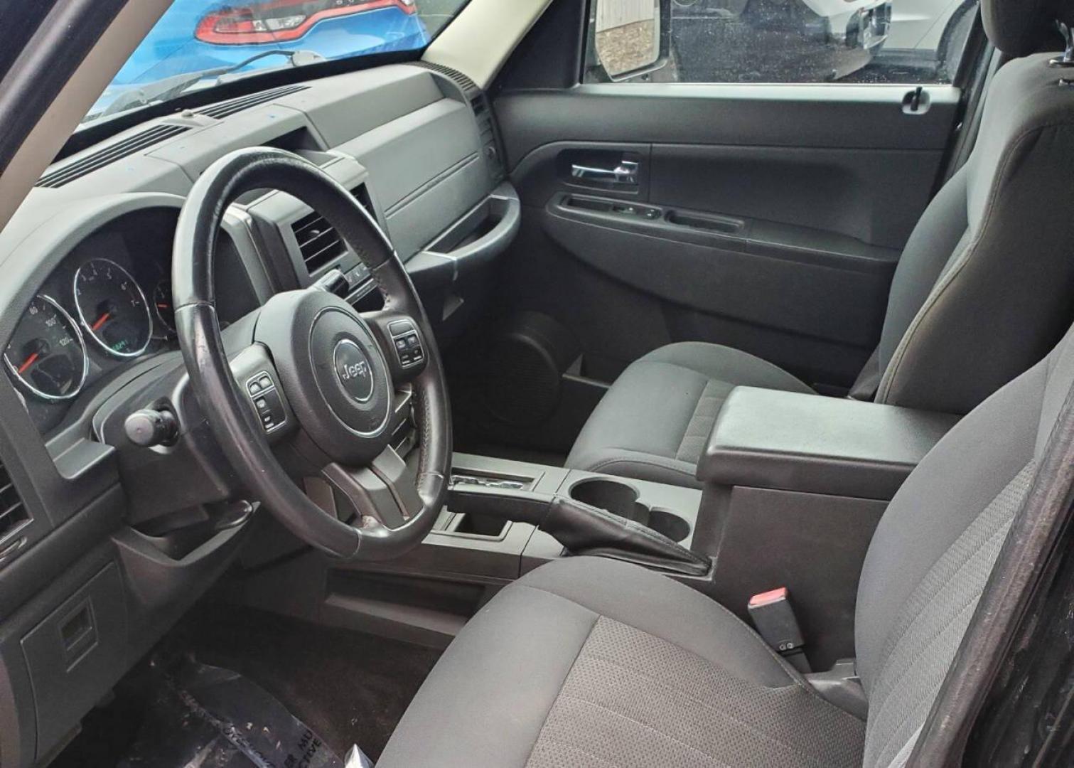 2012 Black Jeep Liberty (1C4PJMAK1CW) with an 3.7L V6 210hp 235ft. lbs. 3.7L V6 engine, located at 4845 Woodbury Pike, Roaring Springs, PA, (814) 317-5008, (814) 317-5008, 40.250935, -78.366959 - 2012 Jeep Liberty Sport 4x4 3.7L V6 4-speed Automatic 168k Miles A/c, Power Windows and Locks, Cruise Control, Sirius XM, CD Player, Keyless Entry. Nice Southern Vehicle! New Inspection. Will come with 3-month/3,000-mile warranty with the option to upgrade. If you have any questions or would like to - Photo#8