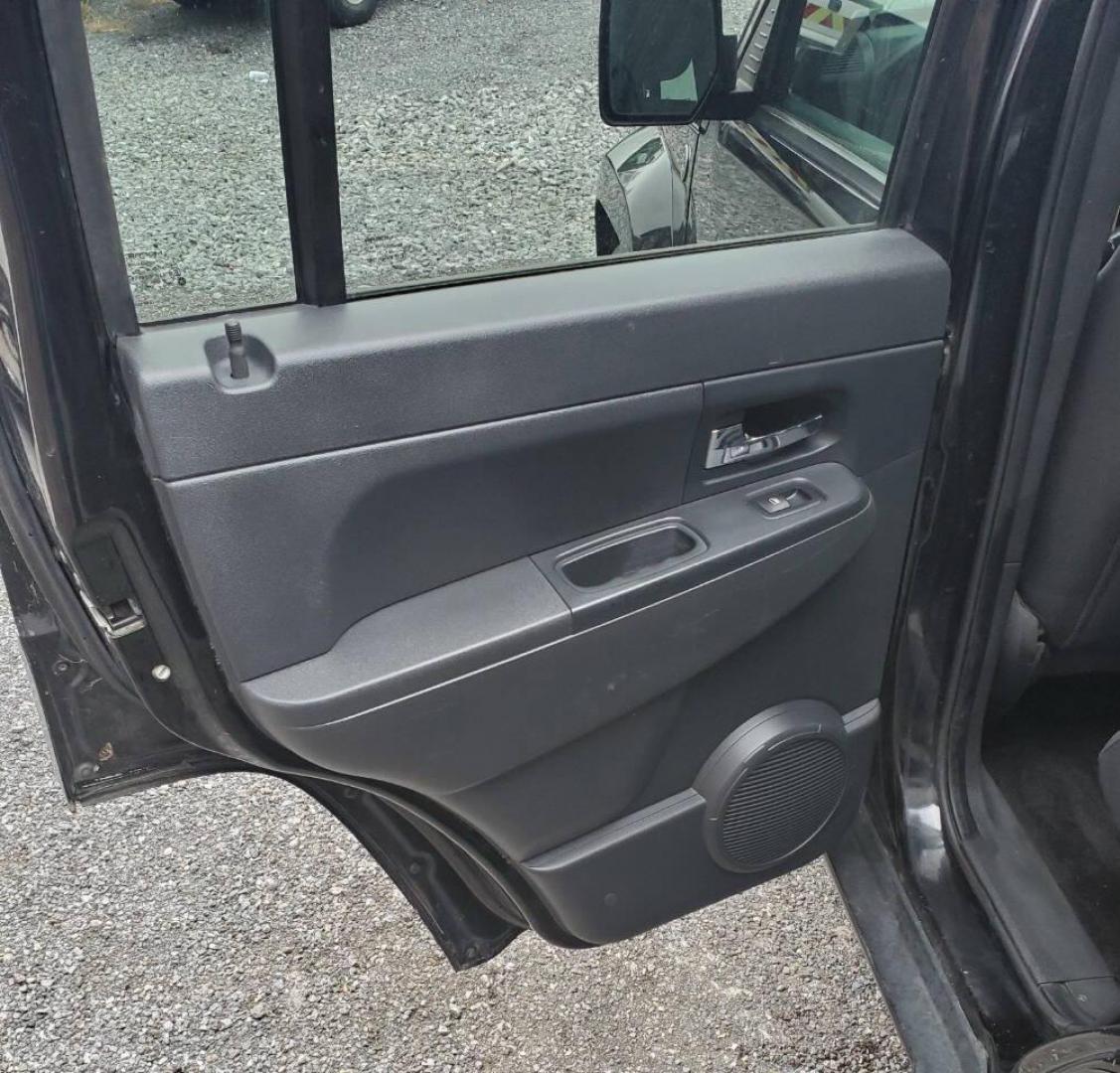 2012 Black Jeep Liberty (1C4PJMAK1CW) with an 3.7L V6 210hp 235ft. lbs. 3.7L V6 engine, located at 4845 Woodbury Pike, Roaring Springs, PA, (814) 317-5008, (814) 317-5008, 40.250935, -78.366959 - 2012 Jeep Liberty Sport 4x4 3.7L V6 4-speed Automatic 168k Miles A/c, Power Windows and Locks, Cruise Control, Sirius XM, CD Player, Keyless Entry. Nice Southern Vehicle! New Inspection. Will come with 3-month/3,000-mile warranty with the option to upgrade. If you have any questions or would like to - Photo#11