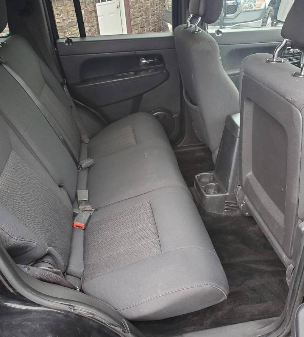 2012 Black Jeep Liberty (1C4PJMAK1CW) with an 3.7L V6 210hp 235ft. lbs. 3.7L V6 engine, located at 4845 Woodbury Pike, Roaring Springs, PA, (814) 317-5008, (814) 317-5008, 40.250935, -78.366959 - 2012 Jeep Liberty Sport 4x4 3.7L V6 4-speed Automatic 168k Miles A/c, Power Windows and Locks, Cruise Control, Sirius XM, CD Player, Keyless Entry. Nice Southern Vehicle! New Inspection. Will come with 3-month/3,000-mile warranty with the option to upgrade. If you have any questions or would like to - Photo#14