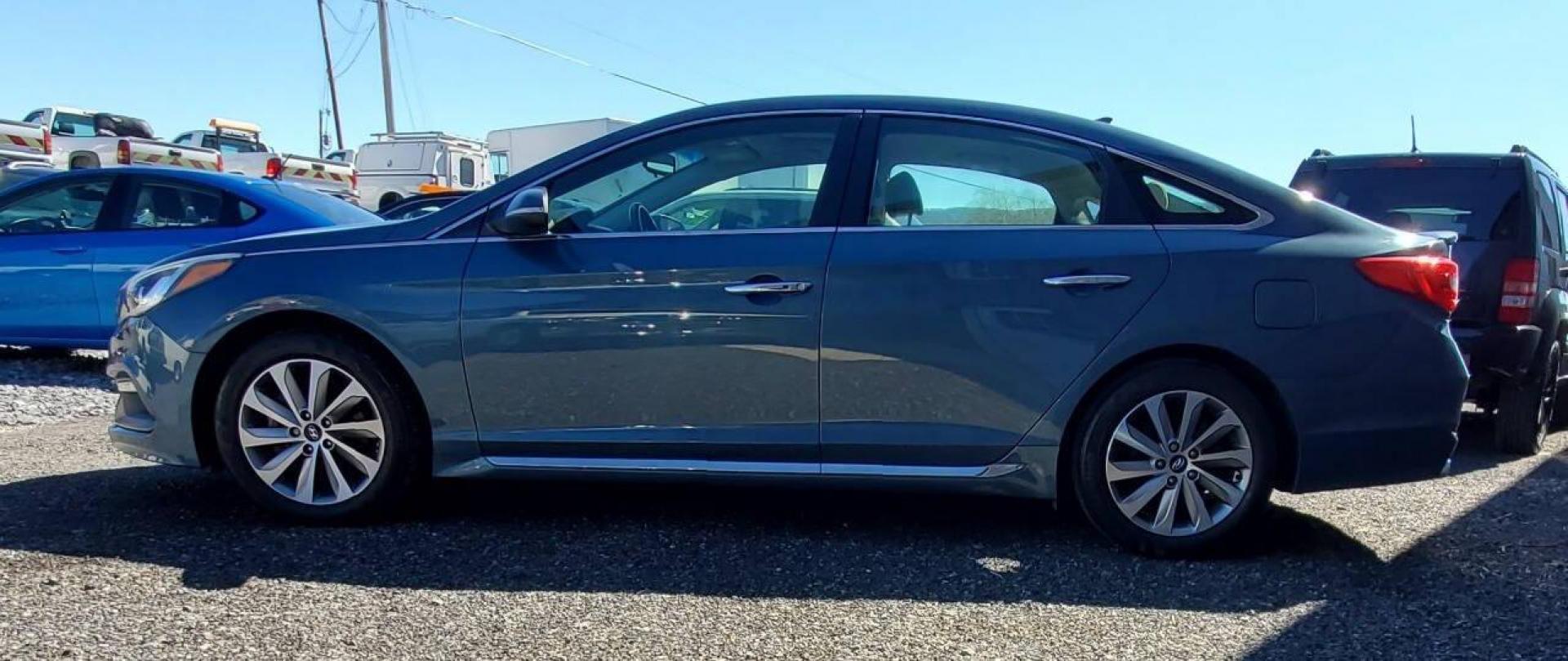 2017 Blue Hyundai Sonata (5NPE34AF4HH) with an 2.4L I4 185hp 178ft. lbs. 2.4L I4 engine, located at 4845 Woodbury Pike, Roaring Springs, PA, (814) 317-5008, (814) 317-5008, 40.250935, -78.366959 - Photo#4