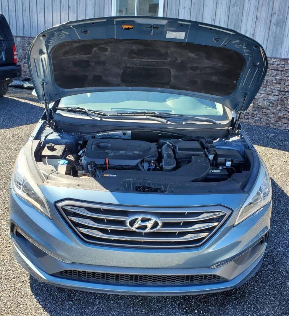 2017 Blue Hyundai Sonata (5NPE34AF4HH) with an 2.4L I4 185hp 178ft. lbs. 2.4L I4 engine, located at 4845 Woodbury Pike, Roaring Springs, PA, (814) 317-5008, (814) 317-5008, 40.250935, -78.366959 - Photo#5