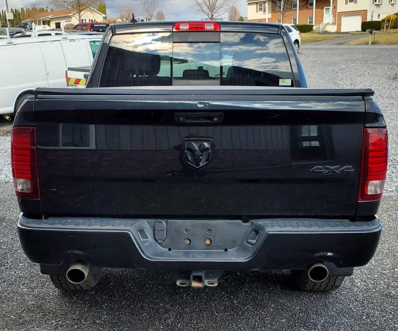 2016 Black RAM 1500 (1C6RR7MTXGS) with an HEMI 5.7L V8 395hp 410ft. lbs. 5.7L V8 engine, located at 4845 Woodbury Pike, Roaring Springs, PA, (814) 317-5008, (814) 317-5008, 40.250935, -78.366959 - Photo#2