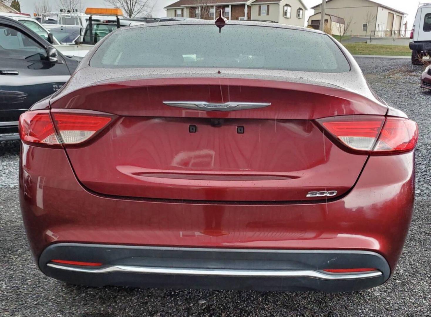 2016 Burgundy Chrysler 200 (1C3CCCAB1GN) with an 2.4L I4 184hp 173ft. lbs. 2.4L I4 engine, located at 4845 Woodbury Pike, Roaring Springs, PA, (814) 317-5008, (814) 317-5008, 40.250935, -78.366959 - 2016 Chrysler 200 Limited FWD 2.4L I4 9-speed Automatic 115k Miles Sirius XM, Bluetooth, Rear Back-up Camera, A/c, Power Windows and Locks, Cruise Control Selling cheaply because it has an R-title due to previous fender damage. That has been repaired. Vehicle will come with new inspection and a 3-mo - Photo#2