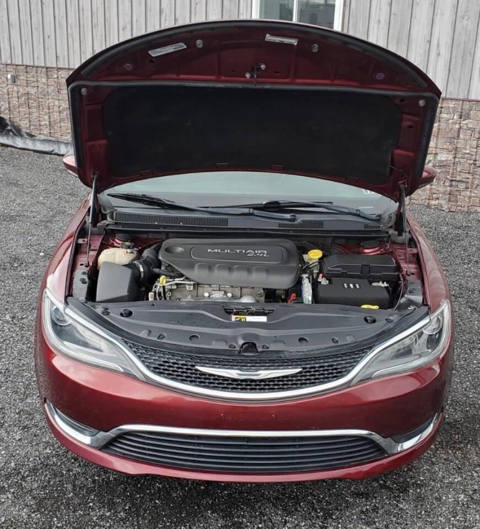 2016 Burgundy Chrysler 200 (1C3CCCAB1GN) with an 2.4L I4 184hp 173ft. lbs. 2.4L I4 engine, located at 4845 Woodbury Pike, Roaring Springs, PA, (814) 317-5008, (814) 317-5008, 40.250935, -78.366959 - 2016 Chrysler 200 Limited FWD 2.4L I4 9-speed Automatic 115k Miles Sirius XM, Bluetooth, Rear Back-up Camera, A/c, Power Windows and Locks, Cruise Control Selling cheaply because it has an R-title due to previous fender damage. That has been repaired. Vehicle will come with new inspection and a 3-mo - Photo#4