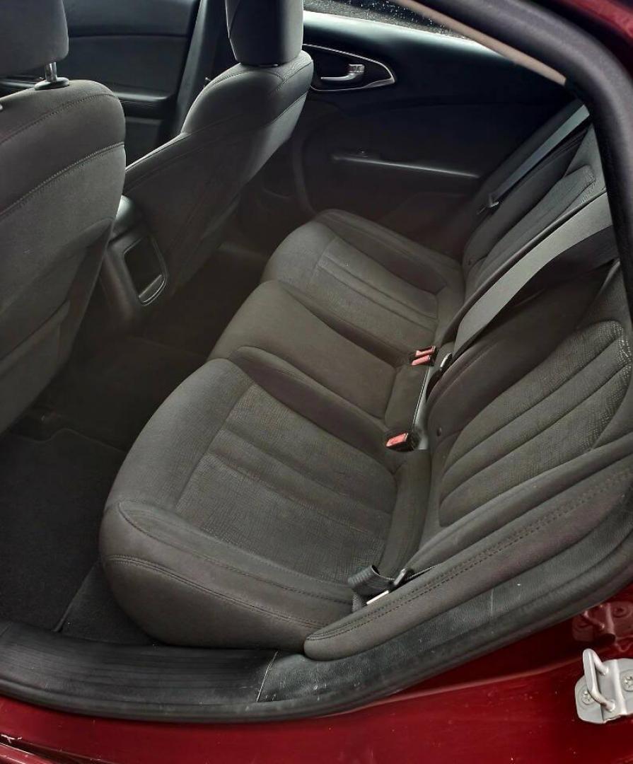 2016 Burgundy Chrysler 200 (1C3CCCAB1GN) with an 2.4L I4 184hp 173ft. lbs. 2.4L I4 engine, located at 4845 Woodbury Pike, Roaring Springs, PA, (814) 317-5008, (814) 317-5008, 40.250935, -78.366959 - 2016 Chrysler 200 Limited FWD 2.4L I4 9-speed Automatic 115k Miles Sirius XM, Bluetooth, Rear Back-up Camera, A/c, Power Windows and Locks, Cruise Control Selling cheaply because it has an R-title due to previous fender damage. That has been repaired. Vehicle will come with new inspection and a 3-mo - Photo#9