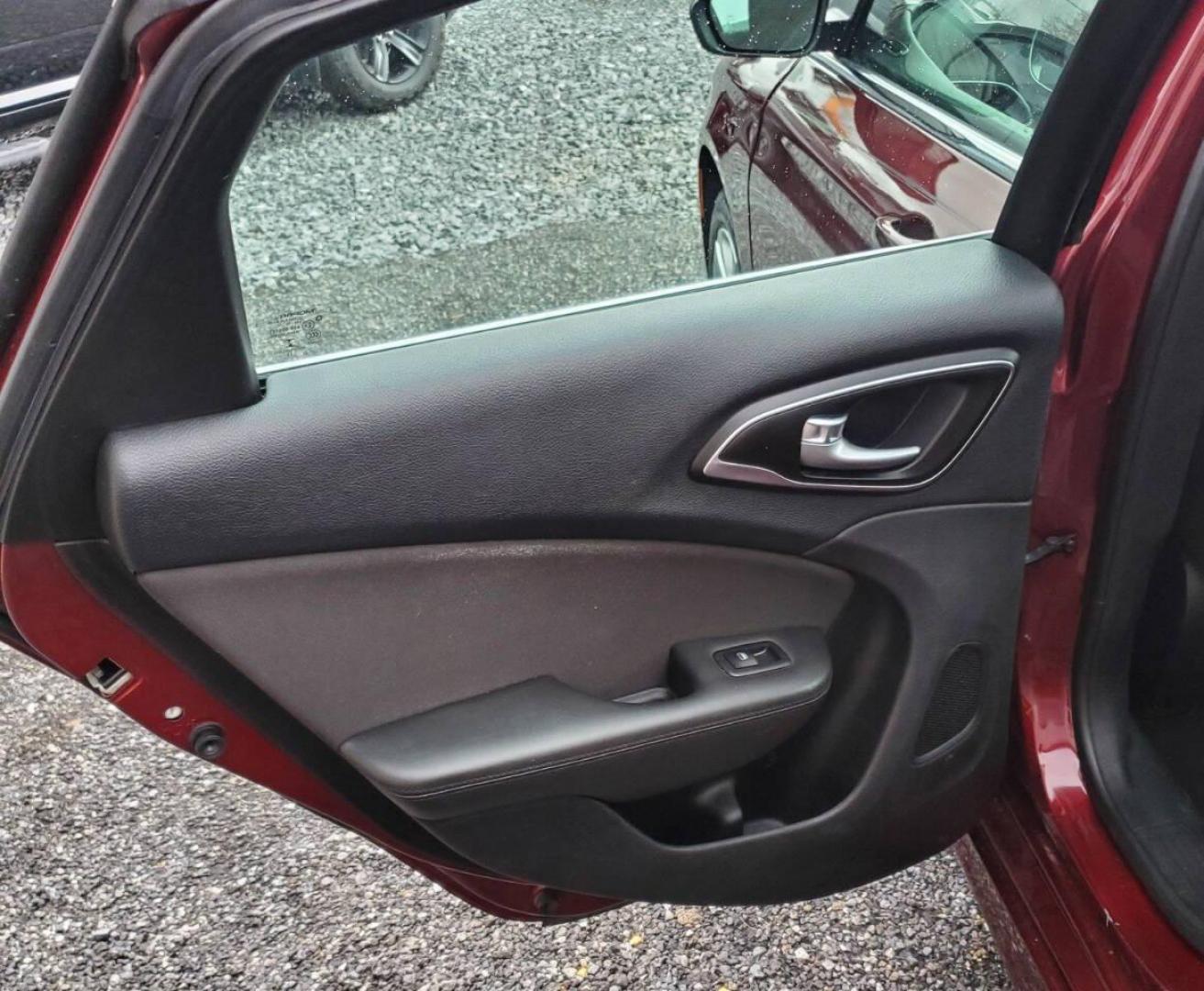 2016 Burgundy Chrysler 200 (1C3CCCAB1GN) with an 2.4L I4 184hp 173ft. lbs. 2.4L I4 engine, located at 4845 Woodbury Pike, Roaring Springs, PA, (814) 317-5008, (814) 317-5008, 40.250935, -78.366959 - 2016 Chrysler 200 Limited FWD 2.4L I4 9-speed Automatic 115k Miles Sirius XM, Bluetooth, Rear Back-up Camera, A/c, Power Windows and Locks, Cruise Control Selling cheaply because it has an R-title due to previous fender damage. That has been repaired. Vehicle will come with new inspection and a 3-mo - Photo#10