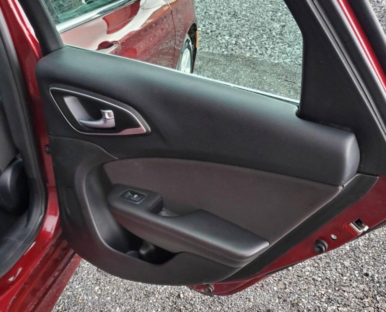 2016 Burgundy Chrysler 200 (1C3CCCAB1GN) with an 2.4L I4 184hp 173ft. lbs. 2.4L I4 engine, located at 4845 Woodbury Pike, Roaring Springs, PA, (814) 317-5008, (814) 317-5008, 40.250935, -78.366959 - 2016 Chrysler 200 Limited FWD 2.4L I4 9-speed Automatic 115k Miles Sirius XM, Bluetooth, Rear Back-up Camera, A/c, Power Windows and Locks, Cruise Control Selling cheaply because it has an R-title due to previous fender damage. That has been repaired. Vehicle will come with new inspection and a 3-mo - Photo#14