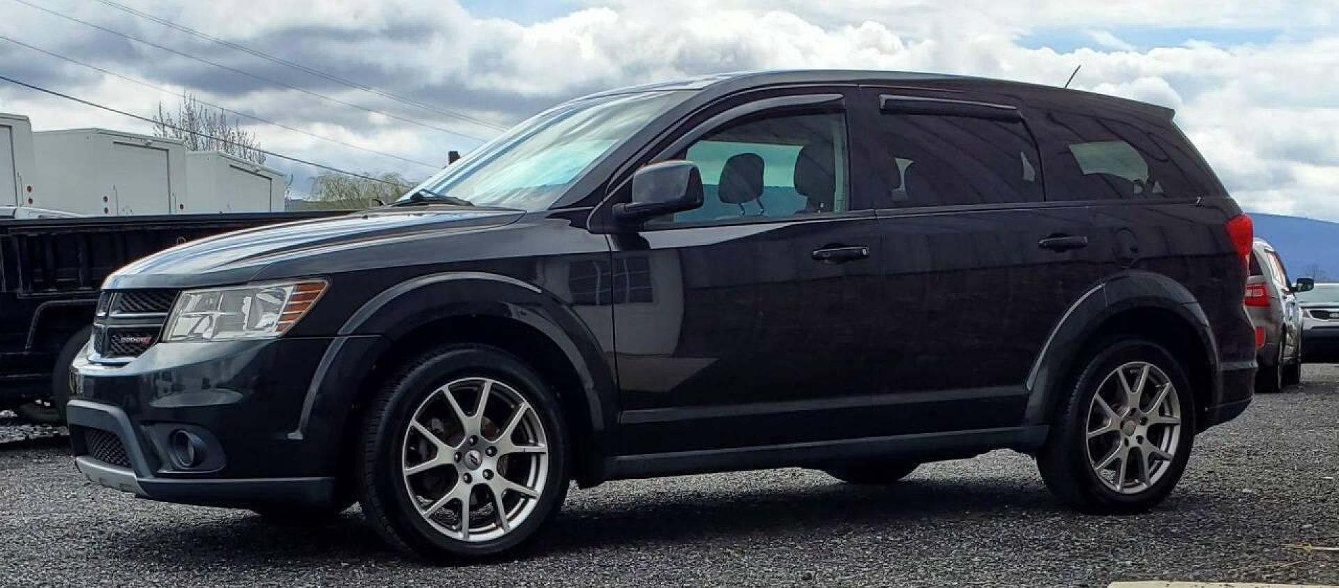 2013 Black Dodge Journey (3C4PDDEG9DT) with an Pentastar 3.6L V6 283hp 260ft. lbs. 3.6L V6 engine, located at 4845 Woodbury Pike, Roaring Springs, PA, (814) 317-5008, (814) 317-5008, 40.250935, -78.366959 - 2013 Dodge Journey R/T AWD 3.6L V6 6-speed Automatic 156k Miles 3rd Row Seating, Heated Front Seats, Heated Steering Wheel, Heated Mirror, Leather, Alpine Sound System, CD Player, Bluetooth, Sirius XM, A/c, Cruise Control, Keyless Entry, Power Windows/Locks. If you have any questions or would like t - Photo#4