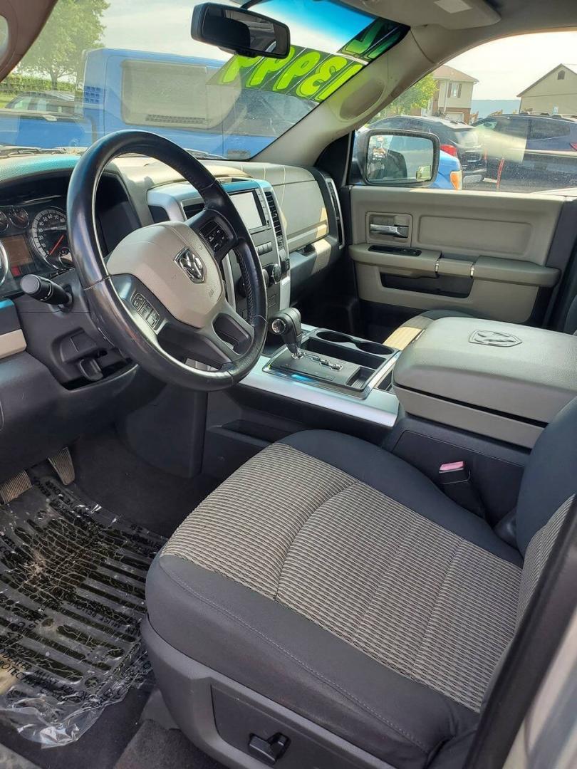 2012 Bright Silver Metallic Clear Coat/Mineral Gray Met RAM 1500 (1C6RD7GT2CS) with an HEMI 5.7L V8 390hp 407ft. lbs. 5.7L V8 engine, located at 4845 Woodbury Pike, Roaring Springs, PA, (814) 317-5008, (814) 317-5008, 40.250935, -78.366959 - **More pics and video to come. Truck will be fully detailed before sale<br />2012 Ram 1500 4x4 Outdoorsman 4 Door Quad Cab 6.3' Short Bed 5.7L V8 Hemi 6-Speed Automatic 105k Miles Rust-Free Southern Truck with a Clean Title A/C, Cruise Control, Alpine Sound System, Sirius XM, Single CD Player, Keyle- Photo#3