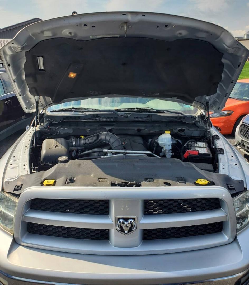 2012 Bright Silver Metallic Clear Coat/Mineral Gray Met RAM 1500 (1C6RD7GT2CS) with an HEMI 5.7L V8 390hp 407ft. lbs. 5.7L V8 engine, located at 4845 Woodbury Pike, Roaring Springs, PA, (814) 317-5008, (814) 317-5008, 40.250935, -78.366959 - **More pics and video to come. Truck will be fully detailed before sale<br />2012 Ram 1500 4x4 Outdoorsman 4 Door Quad Cab 6.3' Short Bed 5.7L V8 Hemi 6-Speed Automatic 105k Miles Rust-Free Southern Truck with a Clean Title A/C, Cruise Control, Alpine Sound System, Sirius XM, Single CD Player, Keyle- Photo#6