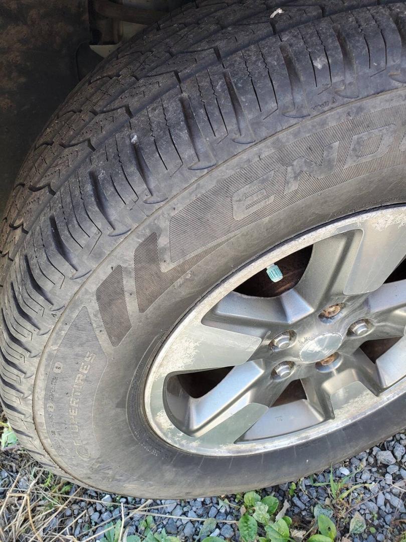 2008 Bright Silver Metallic Clear Coat Jeep Liberty (1J8GN28K68W) with an 3.7L V6 210hp 235ft. lbs. 3.7L V6 engine, located at 4845 Woodbury Pike, Roaring Springs, PA, (814) 317-5008, (814) 317-5008, 40.250935, -78.366959 - 2008 Jeep Liberty Sport 3.7L V6 4-speed automatic 4x4 123k miles A/C, power windows, locks, and mirrors, AM/FM Radio, single CD player, keyless entry. Vehicle has R-Title due to previous damage (minor) to the hood and roof. Vehicle will come with new inspection. If you have any questions or to sched- Photo#7