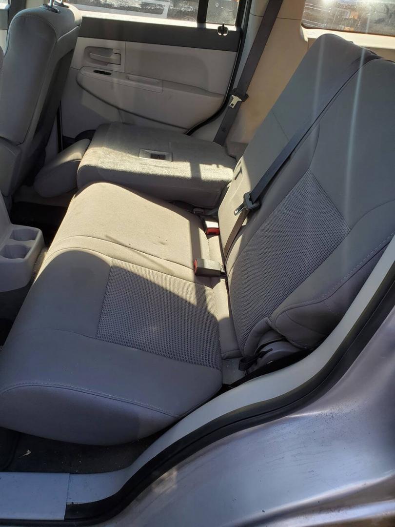 2008 Bright Silver Metallic Clear Coat Jeep Liberty (1J8GN28K68W) with an 3.7L V6 210hp 235ft. lbs. 3.7L V6 engine, located at 4845 Woodbury Pike, Roaring Springs, PA, (814) 317-5008, (814) 317-5008, 40.250935, -78.366959 - 2008 Jeep Liberty Sport 3.7L V6 4-speed automatic 4x4 123k miles A/C, power windows, locks, and mirrors, AM/FM Radio, single CD player, keyless entry. Vehicle has R-Title due to previous damage (minor) to the hood and roof. Vehicle will come with new inspection. If you have any questions or to sched- Photo#10