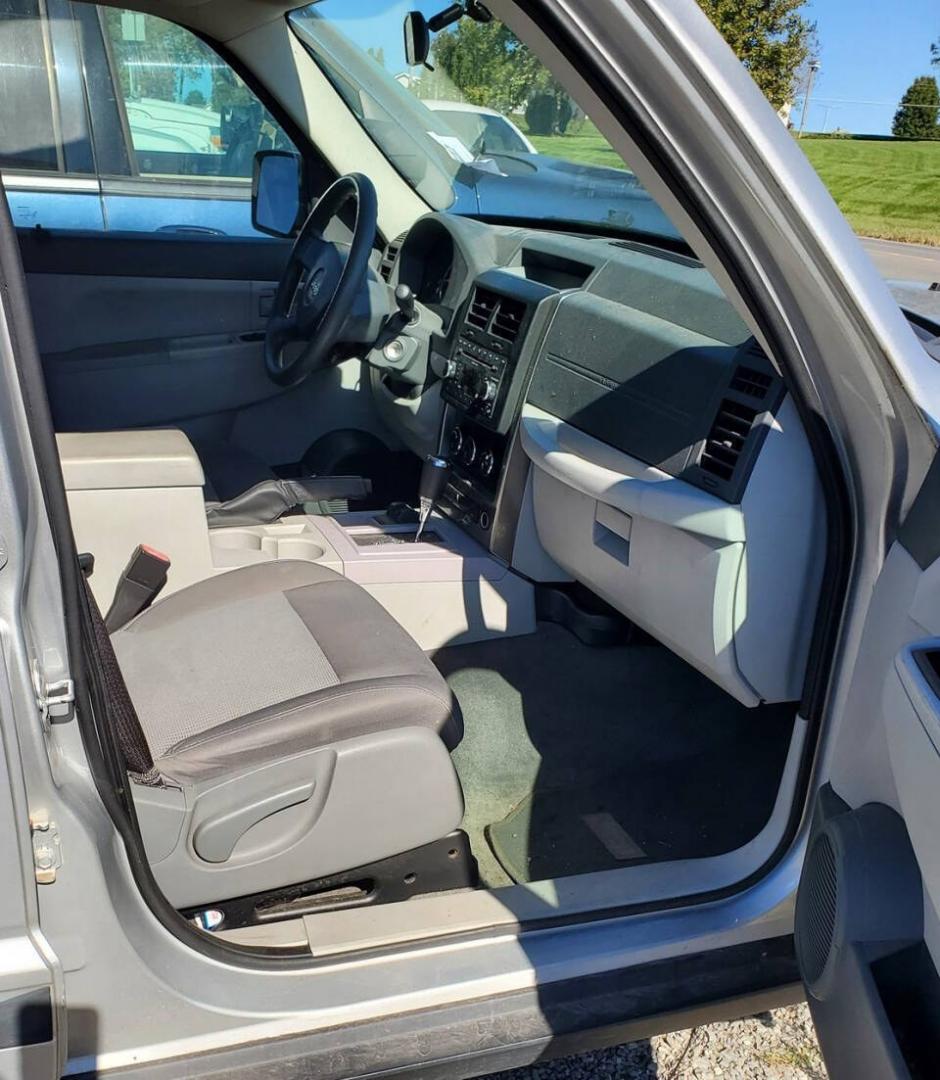 2008 Bright Silver Metallic Clear Coat Jeep Liberty (1J8GN28K68W) with an 3.7L V6 210hp 235ft. lbs. 3.7L V6 engine, located at 4845 Woodbury Pike, Roaring Springs, PA, (814) 317-5008, (814) 317-5008, 40.250935, -78.366959 - 2008 Jeep Liberty Sport 3.7L V6 4-speed automatic 4x4 123k miles A/C, power windows, locks, and mirrors, AM/FM Radio, single CD player, keyless entry. Vehicle has R-Title due to previous damage (minor) to the hood and roof. Vehicle will come with new inspection. If you have any questions or to sched- Photo#12