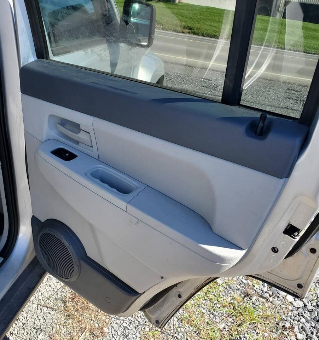 2008 Bright Silver Metallic Clear Coat Jeep Liberty (1J8GN28K68W) with an 3.7L V6 210hp 235ft. lbs. 3.7L V6 engine, located at 4845 Woodbury Pike, Roaring Springs, PA, (814) 317-5008, (814) 317-5008, 40.250935, -78.366959 - 2008 Jeep Liberty Sport 3.7L V6 4-speed automatic 4x4 123k miles A/C, power windows, locks, and mirrors, AM/FM Radio, single CD player, keyless entry. Vehicle has R-Title due to previous damage (minor) to the hood and roof. Vehicle will come with new inspection. If you have any questions or to sched- Photo#15